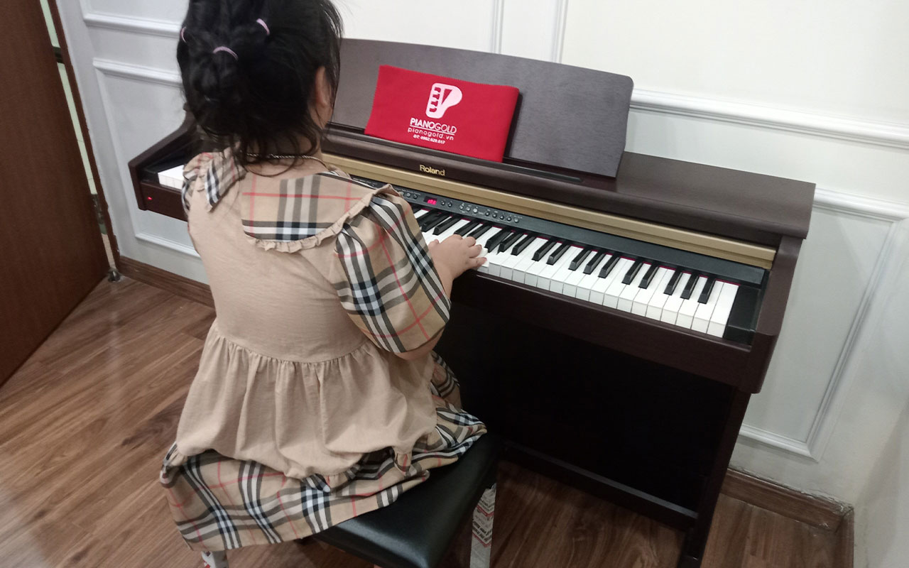 đàn piano roland hp103