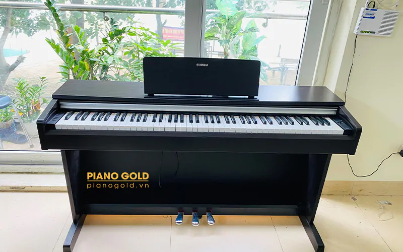 Piano yamaha ydp142